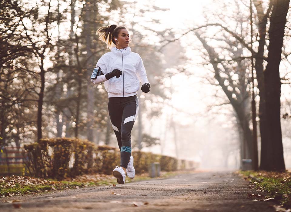 woman running outside in winter