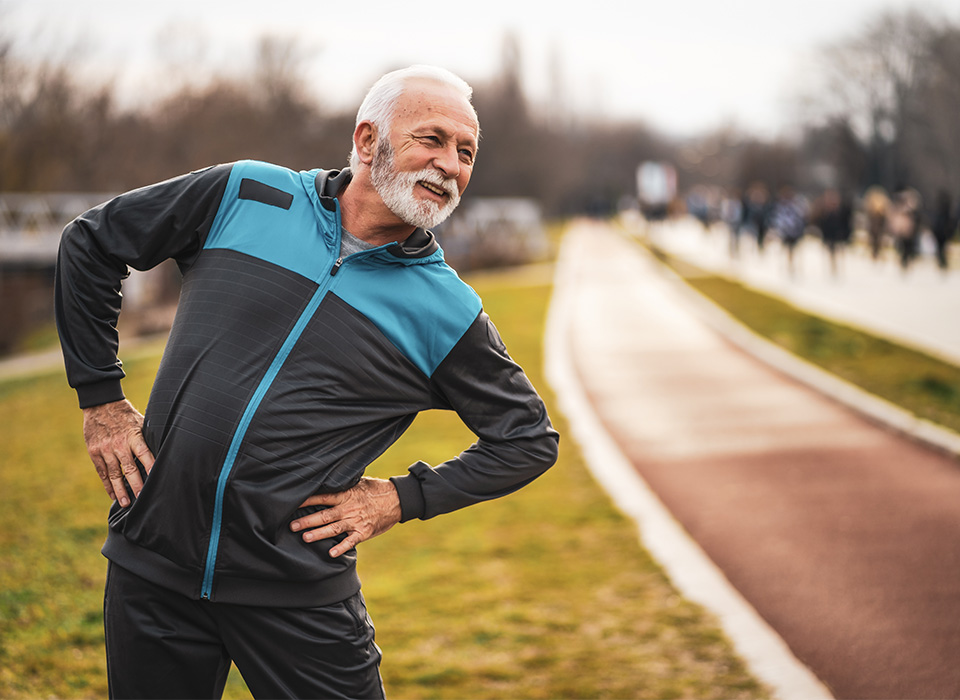man stretching outside