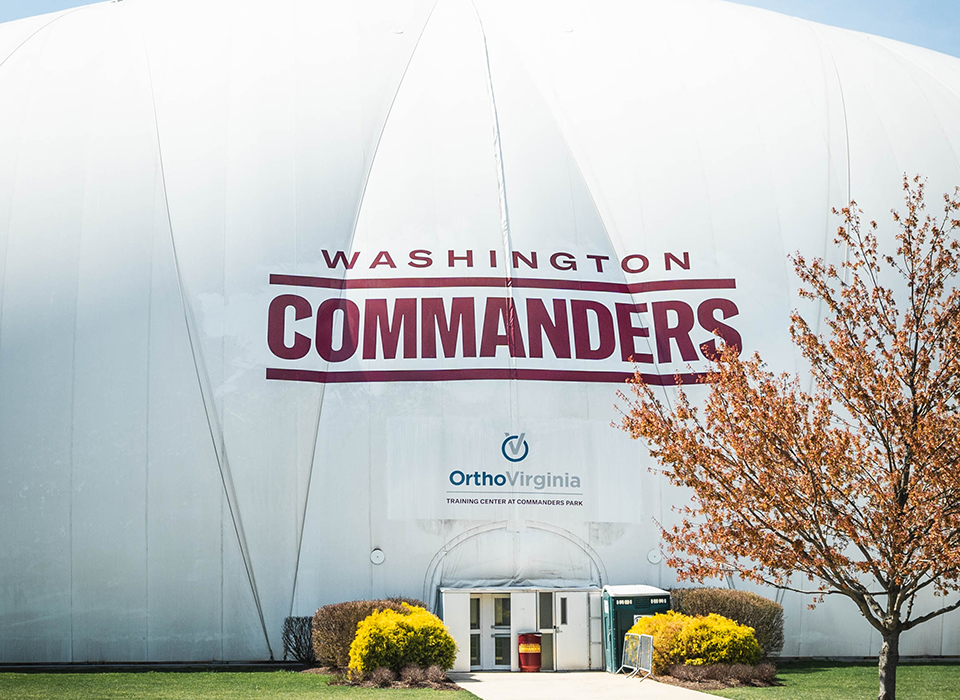 Washington Commanders training center with OrthoVirginia logo