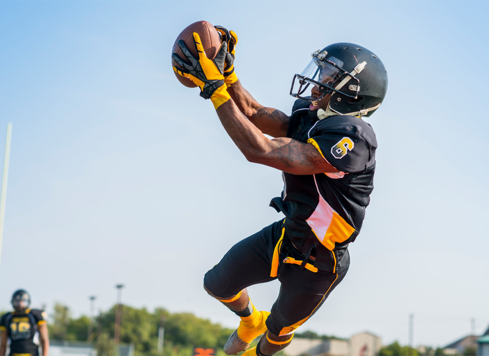 a player catches a football